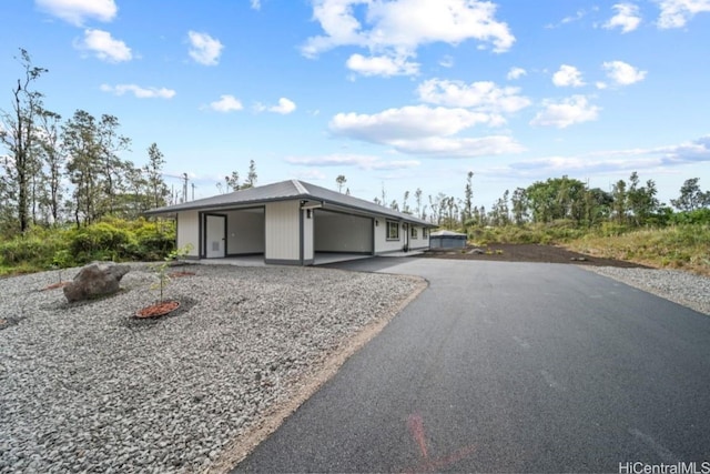 exterior space featuring a garage