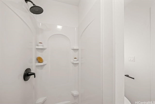 bathroom featuring walk in shower