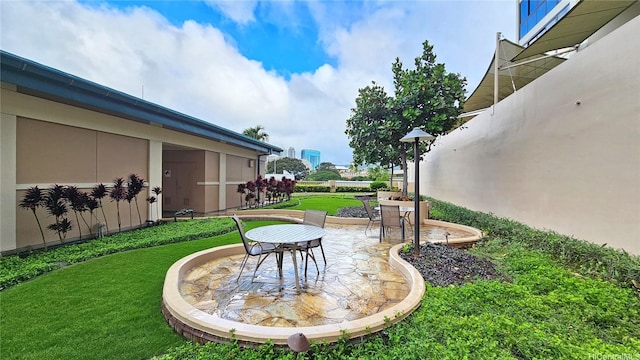 600 Queen St Unit 1405, Honolulu, HI 96813 - view of green lawn with a patio and outdoor dining space