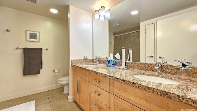 600 Queen St Unit 1405, Honolulu, HI 96813 - full bath with double vanity, a shower stall, tile patterned flooring, and recessed lighting