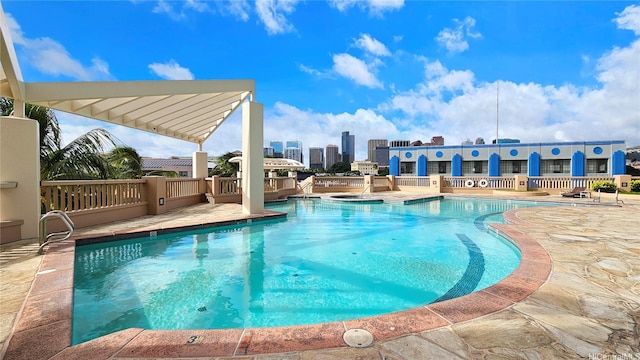 600 Queen St Unit 1405, Honolulu, HI 96813 - community pool featuring a patio area, a view of skyline, and a jacuzzi