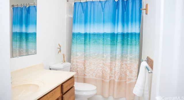 full bathroom featuring vanity, shower / bath combination with curtain, and toilet