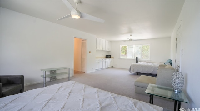 bedroom featuring ceiling fan and light colored carpet