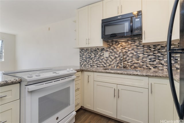 kitchen featuring light stone countertops, decorative backsplash, dark wood-type flooring, sink, and electric stove