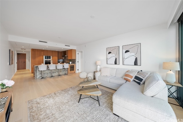 living room with light wood-type flooring