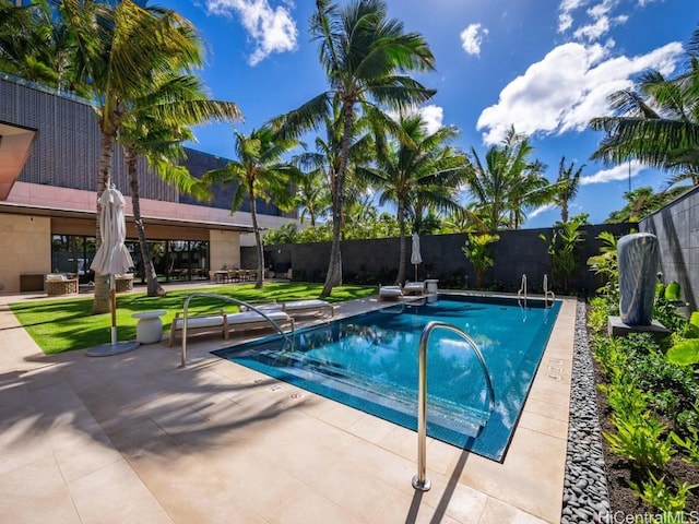 view of swimming pool featuring a patio