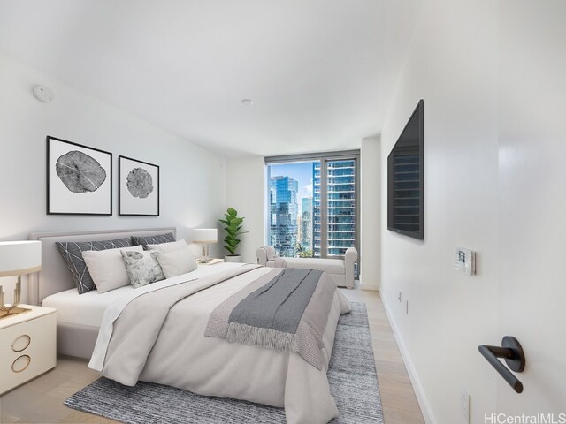 bedroom featuring light hardwood / wood-style floors