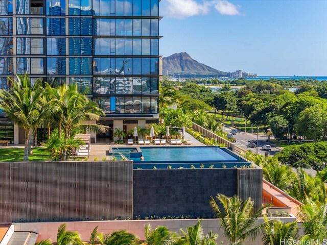 view of pool with a mountain view