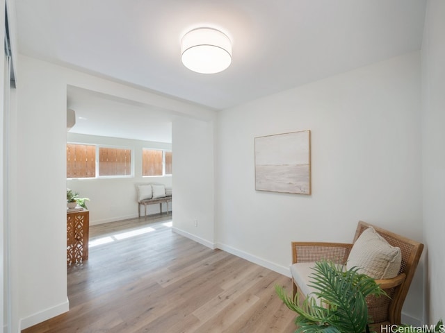 corridor featuring light hardwood / wood-style flooring