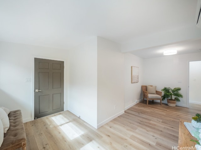 living area featuring light hardwood / wood-style floors