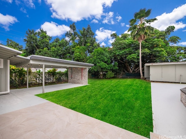 view of yard featuring a carport