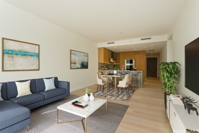 living room with light wood-type flooring