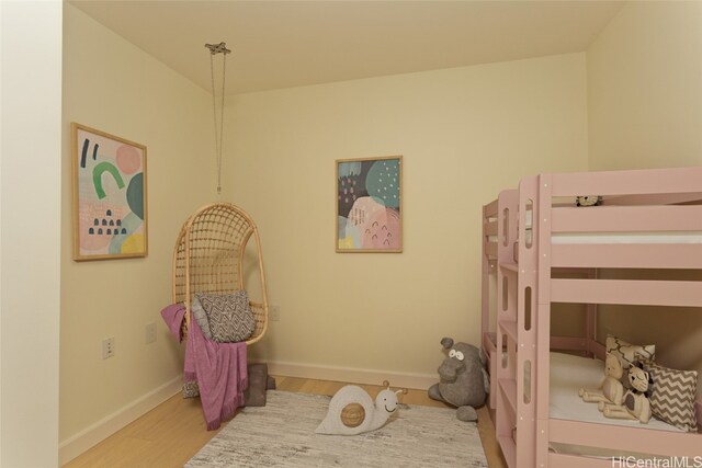 bedroom featuring wood-type flooring