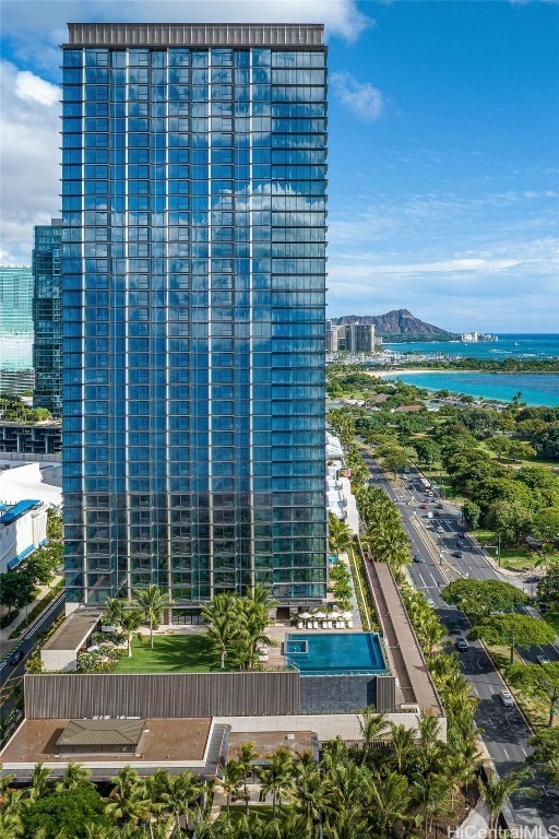 view of property with a water view