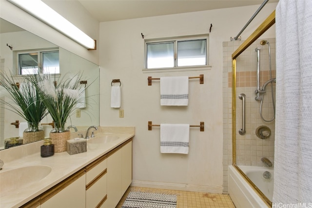 bathroom featuring tile patterned floors, vanity, shower / tub combo with curtain, and plenty of natural light