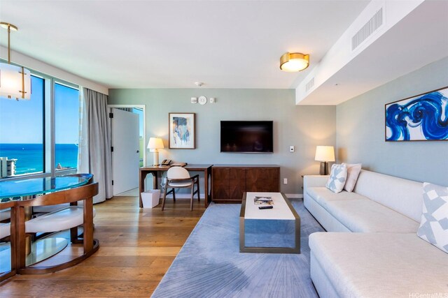 2139 Kuhio Ave Unit D2908, Honolulu, HI 96815 - living room with wood finished floors