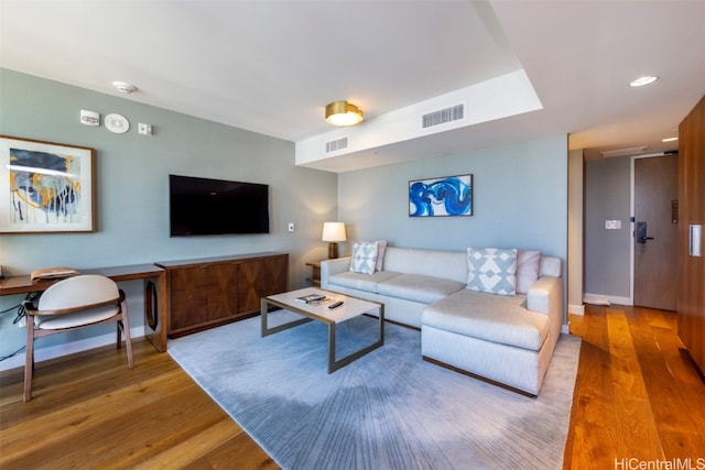 living room featuring hardwood / wood-style floors