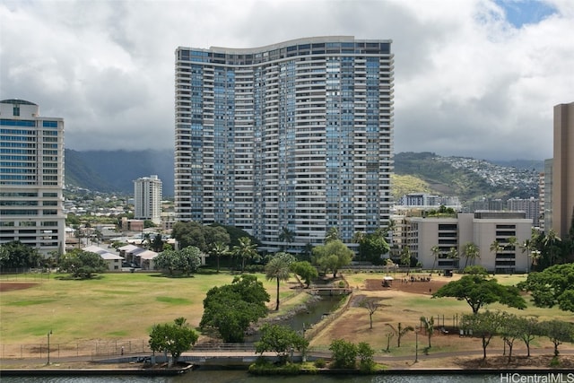 view of building exterior featuring a mountain view