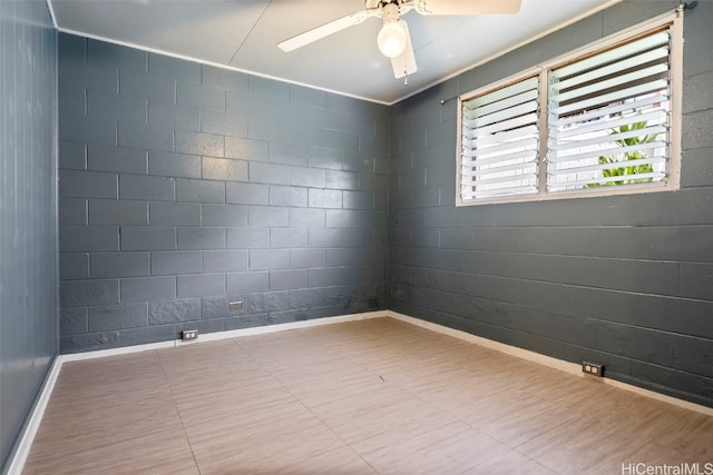 spare room with ceiling fan