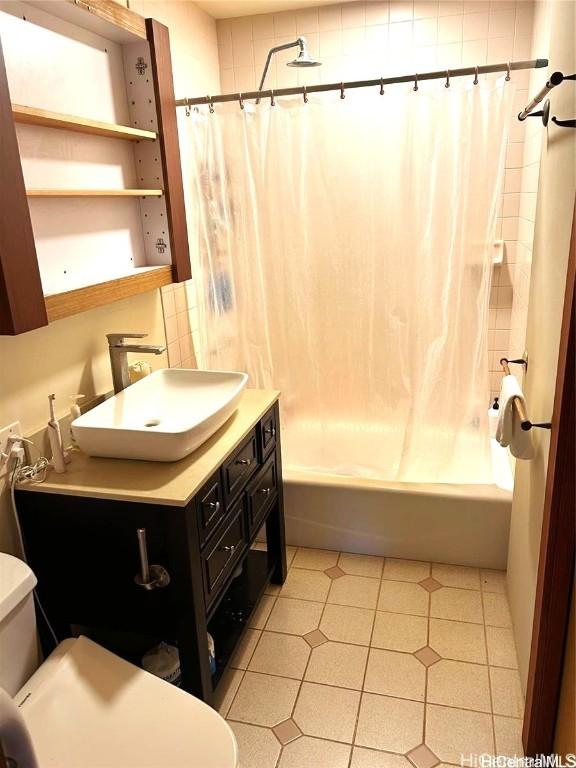 bathroom with vanity and shower / bathtub combination with curtain