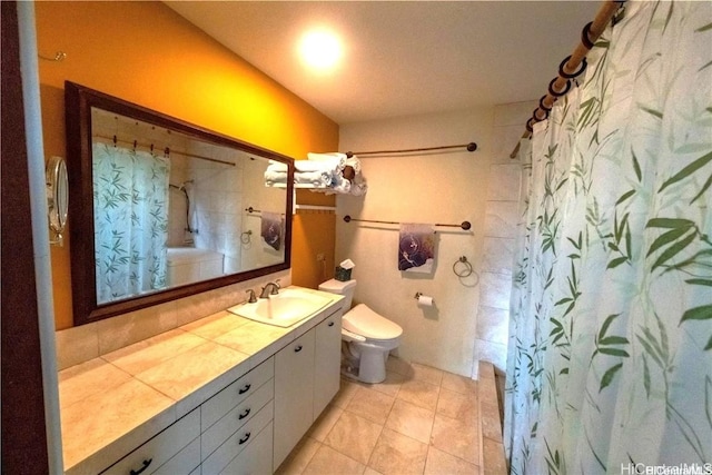 bathroom with vanity, toilet, and walk in shower