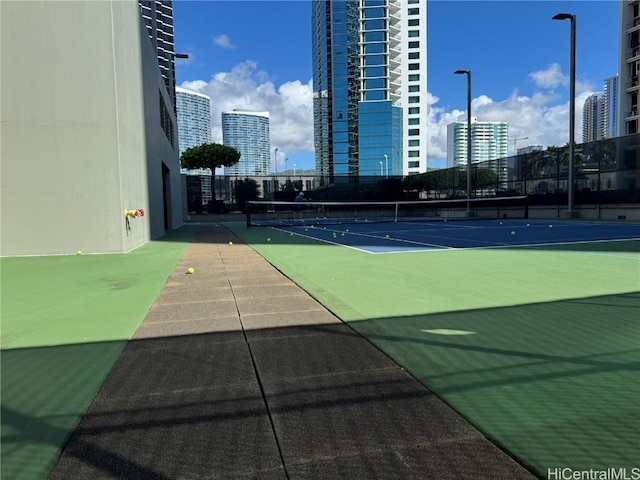 view of sport court with tennis court