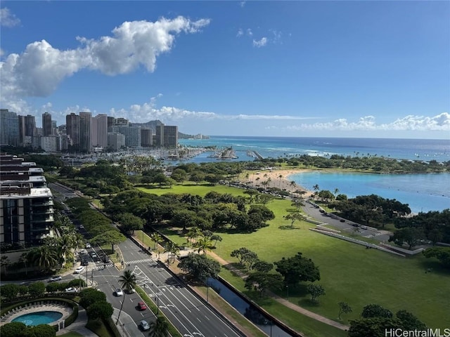 birds eye view of property with a water view