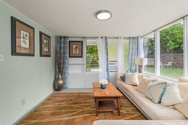 251 Kalalau St, Honolulu, HI 96825 - living area with a textured ceiling and baseboards