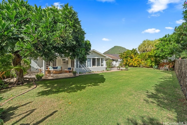 view of yard with a fenced backyard and a patio area