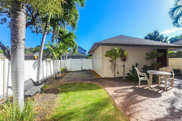 91-1001 Kaihi St, Ewa Beach, HI 96706 - view of yard featuring a gate and a patio
