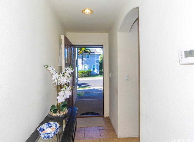 doorway featuring light tile patterned floors