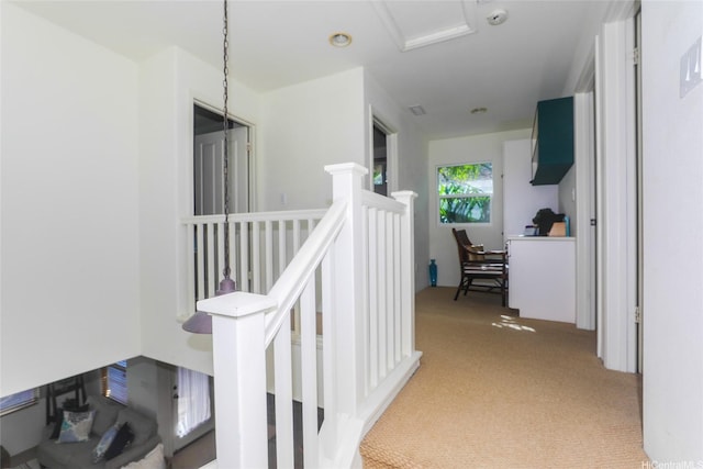 91-1001 Kaihi St, Ewa Beach, HI 96706 - hallway featuring light carpet and an upstairs landing