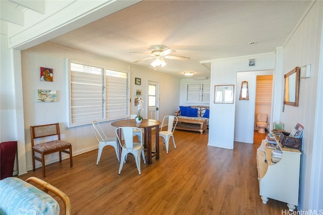 dining area featuring hardwood / wood-style flooring and ceiling fan