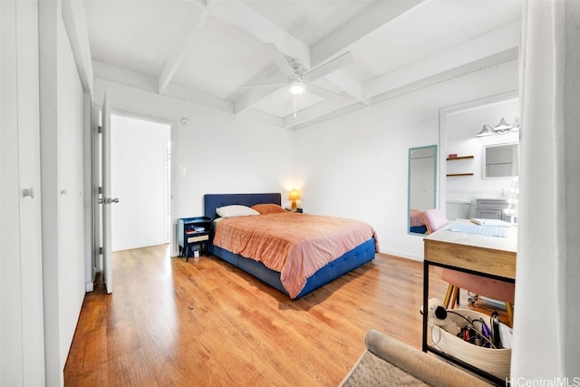 bedroom with ceiling fan, beam ceiling, wood-type flooring, and coffered ceiling