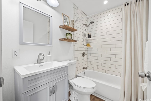 bathroom with shower / tub combo with curtain, vanity, toilet, and wood finished floors
