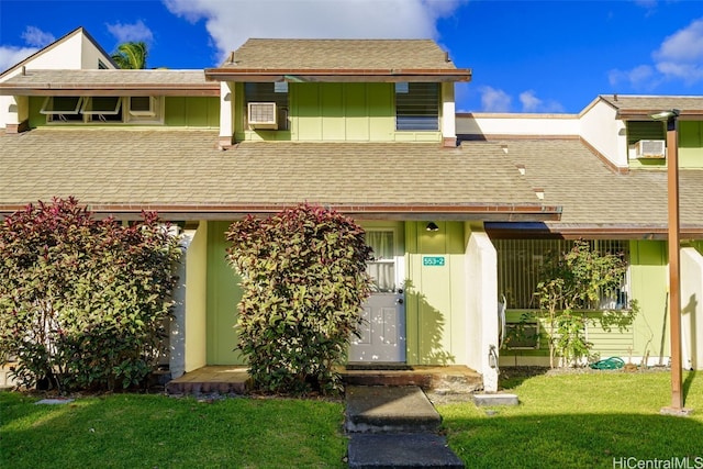 view of property with a front lawn