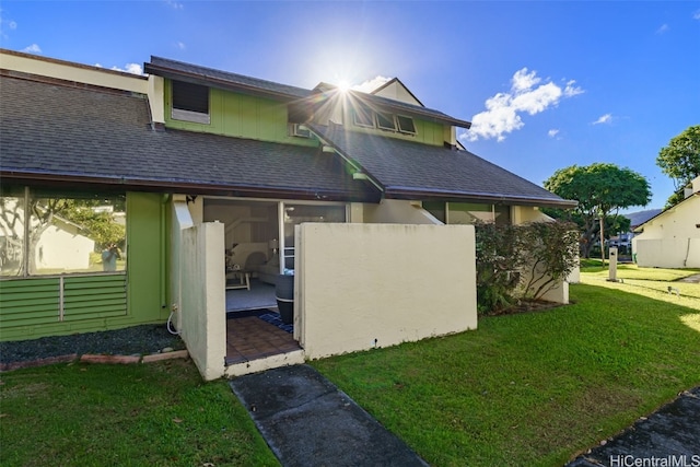 exterior space with a front yard