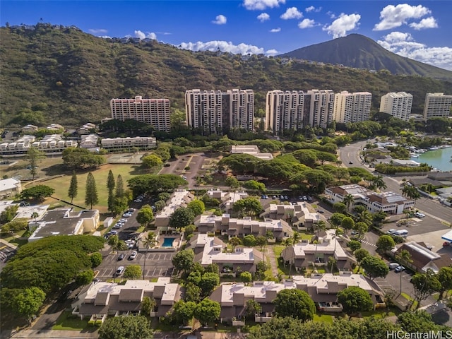 birds eye view of property with a mountain view