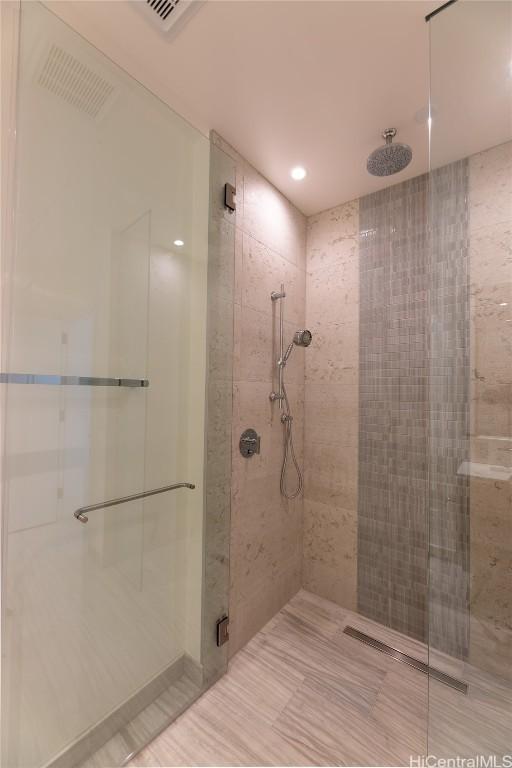 bathroom featuring walk in shower