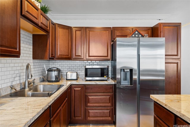 613 Kalakaua St, Wailuku, HI 96793 - kitchen with stainless steel appliances, tasteful backsplash, and light stone counters