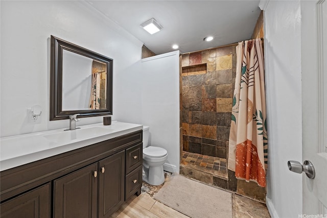 613 Kalakaua St, Wailuku, HI 96793 - full bath with a tile shower, vanity, recessed lighting, stone finish floors, and ornamental molding
