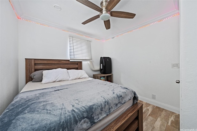 613 Kalakaua St, Wailuku, HI 96793 - bedroom with wood finished floors and a ceiling fan