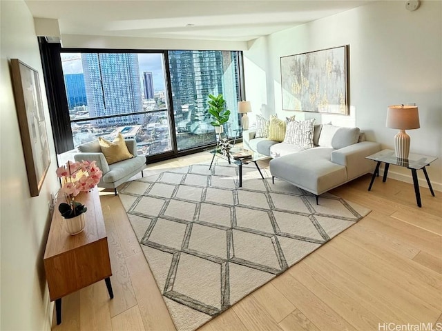 interior space with a wealth of natural light and hardwood / wood-style floors