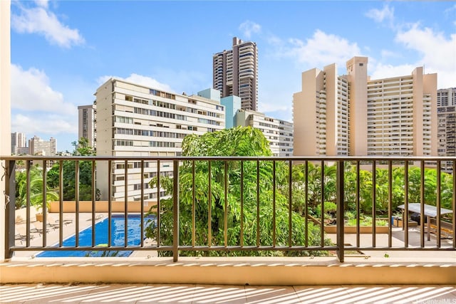 411 Hobron Ln Unit 703, Honolulu, HI 96815 - balcony with a city view and view of pool area