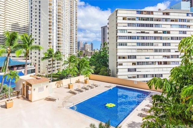 view of pool featuring a patio