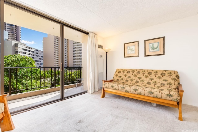 411 Hobron Ln Unit 703, Honolulu, HI 96815 - sitting room with carpet floors and a textured ceiling