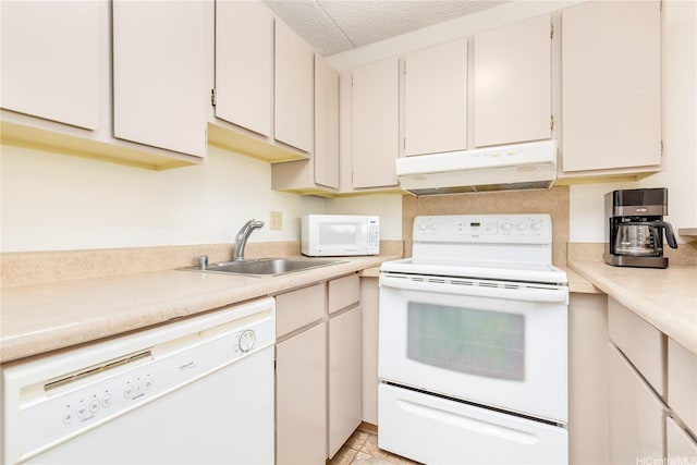 411 Hobron Ln Unit 703, Honolulu, HI 96815 - kitchen with white appliances, under cabinet range hood, and light countertops