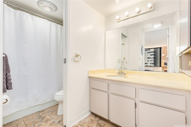 411 Hobron Ln Unit 703, Honolulu, HI 96815 - bathroom with stone finish flooring, vanity, and a shower with curtain