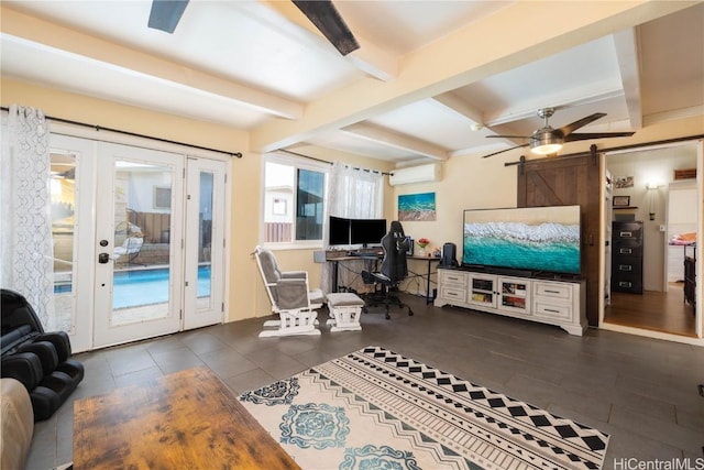 living room with ceiling fan, beam ceiling, a barn door, french doors, and an AC wall unit