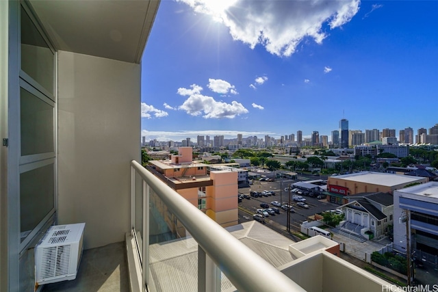 balcony featuring a wall unit AC